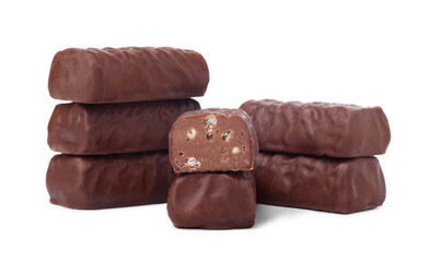 Stacks of chocolate candies isolated on white background, small depth of focus.