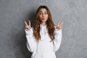 Portrait of a cheerful excited pretty young girl