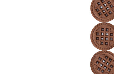 Chocolate chip cookies with space for text. Round biscuits with cream filling