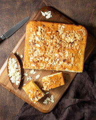 Biscuit cake. Traditional Norwegian pie. Cake with cinnamon and almond petals. Scandinavian pastries