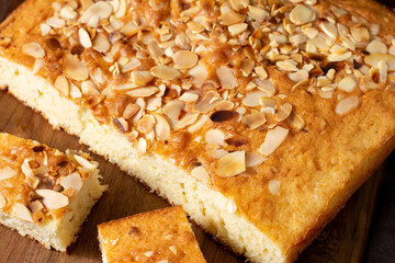 Biscuit cake. Traditional Norwegian pie. Cake with cinnamon and almond petals. Scandinavian pastries