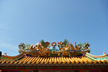 Beautiful Dragon Sculpture on The Roof in Wihan Thep Sathit Phra Kitthi Chalerm Shrine (Nacha Sa Thai Chue Shrine or Naja Shrine) Bang Sean, Chonburi, Thailand