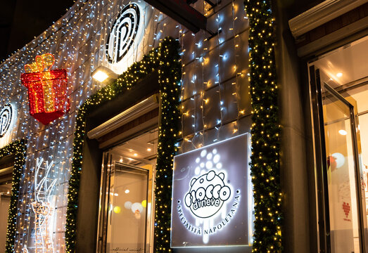 NAPLES, ITALY - DECEMBER 14, 2019: Famous Poppella pastry shop known for its tasty traditional sfogliatella, fiocco di neve (snowflake - brioche stuffed with ricotta cream), baba, cannoli. 