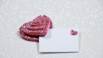 Romantic shiny pink heart with blank letter front for text among white background