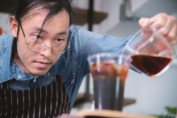 barista focus neatly to making fine espresso shot