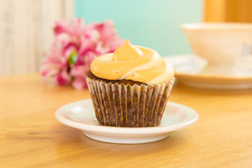 Cupcake with tea time background