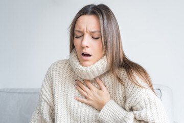 Woman having breath difficulties. Shortness of breath. Coronavirus cough breathing problem - obrazy, fototapety, plakaty