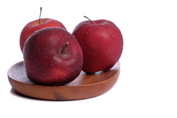 Fresh red Apple fruit with water drops isolated on white background with clipping path.