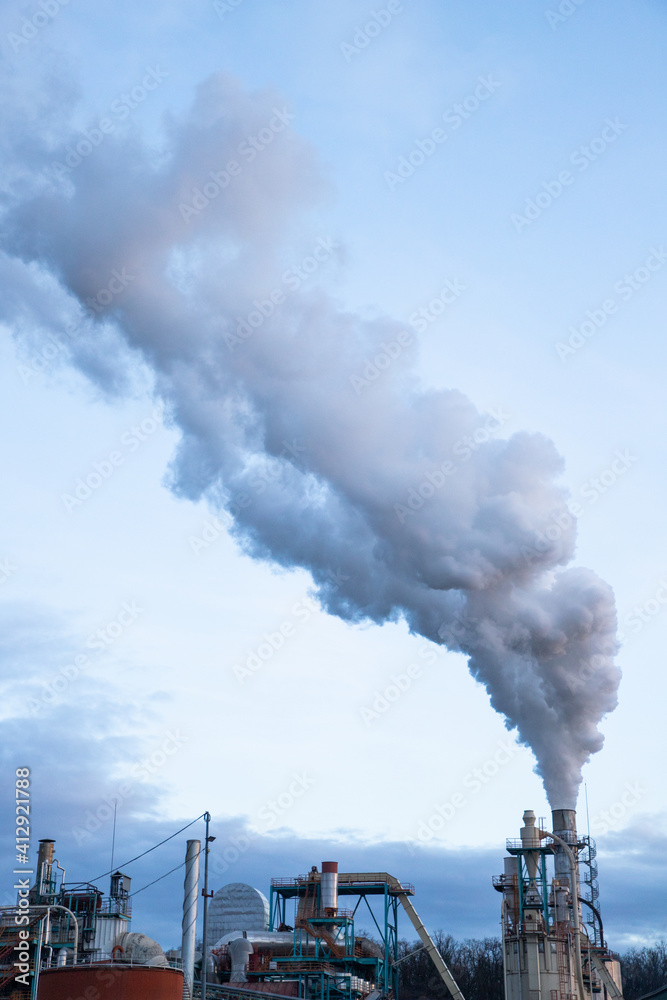 Wall mural smoke coming out of factory chimney industry and global warming