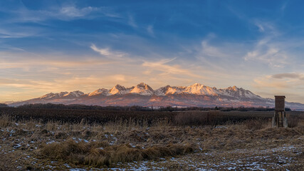 sunset over the sub-Tatra town of Svit with a hunting possession