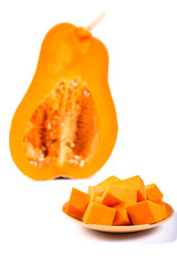 Pumpkin isolated on a white. Chopped pumpkin on plate.