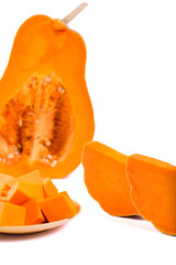 Orange pumpkin isolated on a white. Pieces of pumpkin.