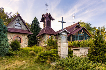 Fototapeta na wymiar Chapel complex at top of Gron Jana Pawla II - John Paul II peak in Little Beskids mountains near Andrychow in Lesser Poland