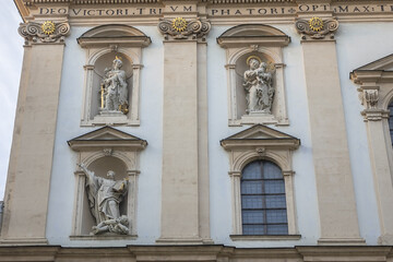 Fototapeta na wymiar Baroque Jesuit Church (Jesuitenkirche, 1627), also known as University Church (Universitatskirche) - two-floor, double-tower church in Vienna. Austria.