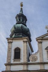 Obraz premium Baroque Jesuit Church (Jesuitenkirche, 1627), also known as University Church (Universitatskirche) - two-floor, double-tower church in Vienna. Austria.