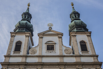 Fototapeta na wymiar Baroque Jesuit Church (Jesuitenkirche, 1627), also known as University Church (Universitatskirche) - two-floor, double-tower church in Vienna. Austria.