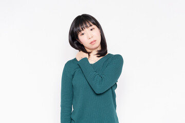 Fototapeta premium 肩こりに悩む女性