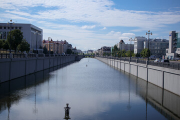 Colorful buildings on the river bank . Yoshkar-Ola. Russia