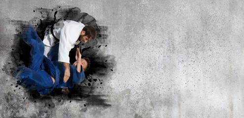 Martial arts masters on wall background