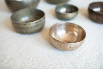 Singing bowls or Tibetan bowls and wooden mallet or stick for meditation, mindfulness, sound healing, relaxation. 
