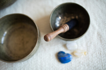 Singing bowls or Tibetan bowls and wooden mallet or stick for meditation, mindfulness, sound...