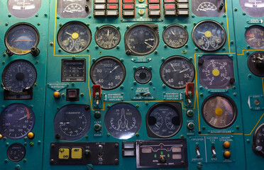 Aircraft instruments on a dashboard of an old made in USSR plane, close up