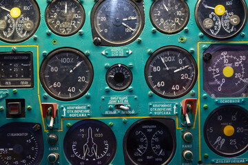 Aircraft instruments on a dashboard of an old made in USSR plane, close up