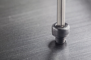 Hex wrench screw hex bolt in metal steel plate. Spanner, bolt, screw and nuts.