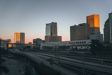 Fototapeta na wymiar panorama views miami florida morning buildings business road street sky blue orange sunrise 