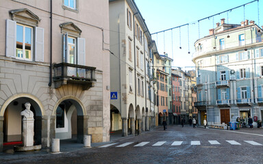 Panorama of the picturesque houses of Piazza Pontida in lower Bergamo. In the background, the bell tower of the Basilica of Sant'Alessandro in Colonna