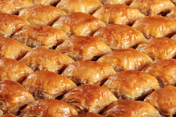 Traditional Turkish dessert Baklava. With walnuts and pistachios.