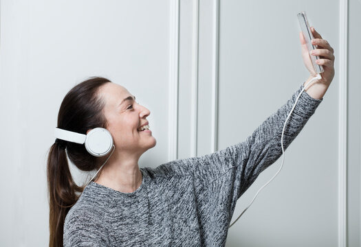 Older Attractive Woman Making Video Conference From Home