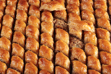 Traditional Turkish dessert Baklava. With walnuts and pistachios.