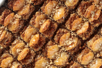 Traditional Turkish dessert Baklava. With walnuts and pistachios.