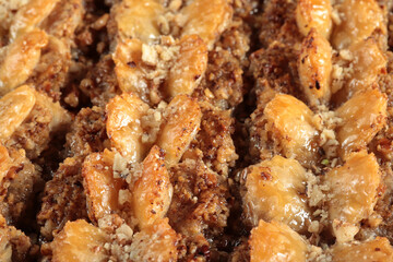Traditional Turkish dessert Baklava. With walnuts and pistachios.