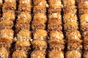 Traditional Turkish dessert Baklava. With walnuts and pistachios.