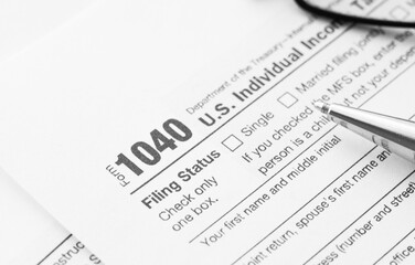 Filling the 1040 Tax Form. Standard US Income Tax Return form.