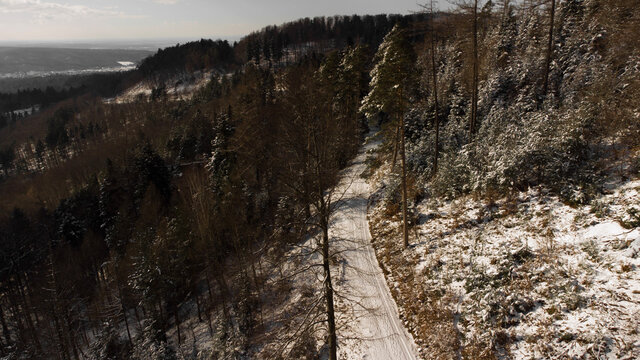 Forestpictures with snow in the Blackforest. The pictures is taken by a drone . It was sunny weather. The Horizon is beautiful. The location is Freiholsheim near Baden-Baden 