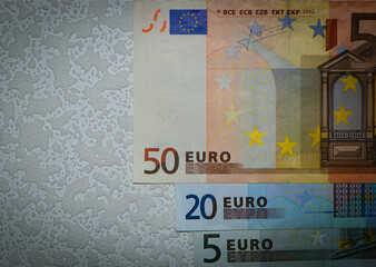 Euro. Background from different banknotes, different denominations, 5, 20, 50 euros. paper money, currency, cash. close-up. finance, payment, trade, financial transactions concepts