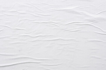 Blank white crumpled and creased paper poster texture background