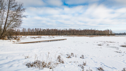 Sunny day on a winter lake