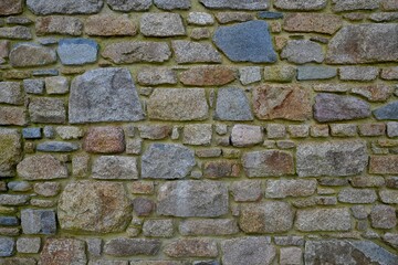 Beautiful wall in granite stones in Brittany. France