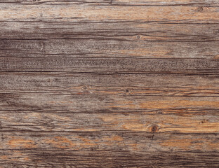 weathered natural wooden planks pattern closeup, brown background