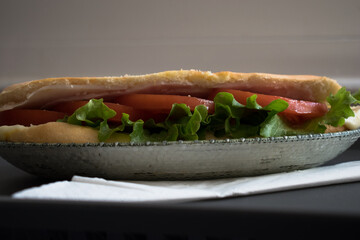 One fresh submarine sandwich in baguette
