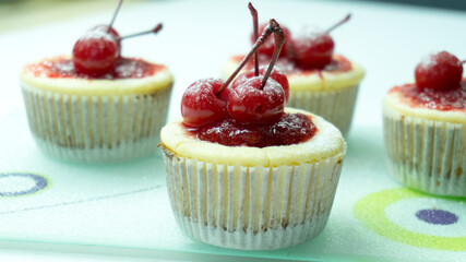 mini cheesecake muffin with cherries