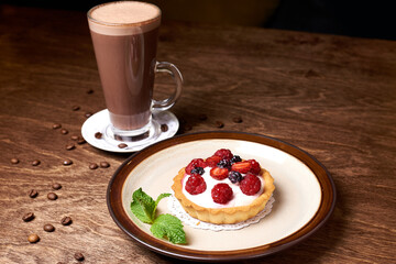 sweet dessert in a round plate on a wooden background