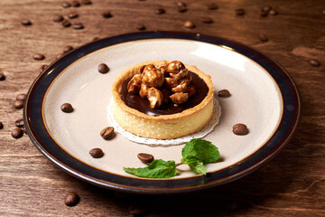 sweet dessert in a round plate on a wooden background