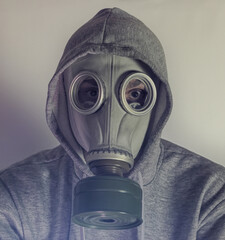 A man in a gas mask. Stalker. Sepia 
