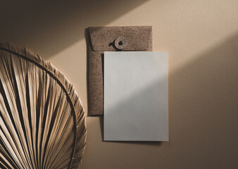 Blank uncoated paper card isolated on beige boho style background