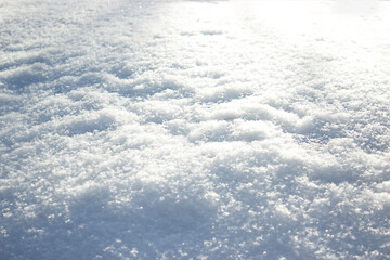 Fototapeta na wymiar abstract background shiny snow on a sunny day